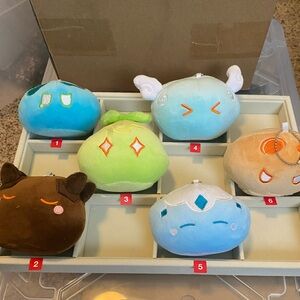 2- $5. Slim Figure Plush doll complete w/chain to hook on luggage,purse,backpack